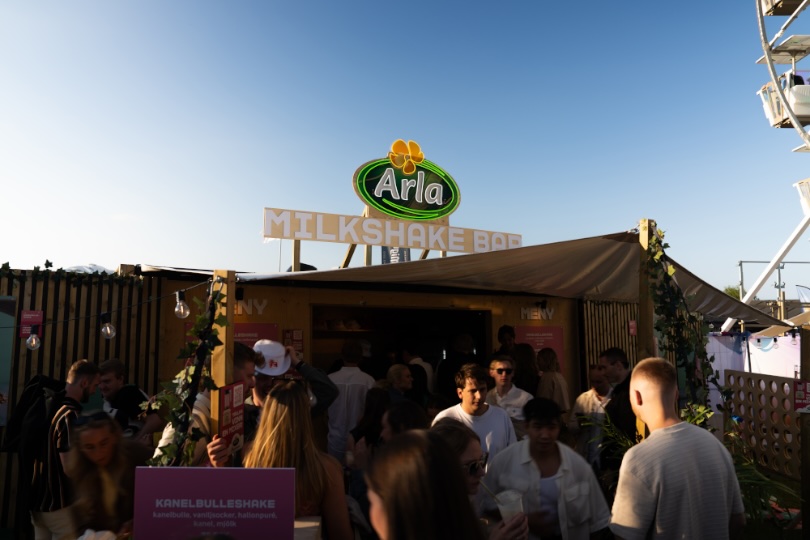 The Arla stand at Summer On with the ferris wheel behind it